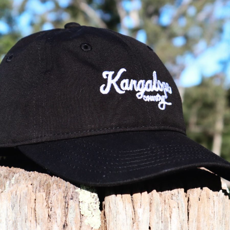 Kangalope dad cap on piece of wood